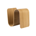 Wooden bookend with curved design on a white background