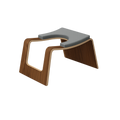 Modern yoga headstand stool with wooden base and grey cushion on a white background